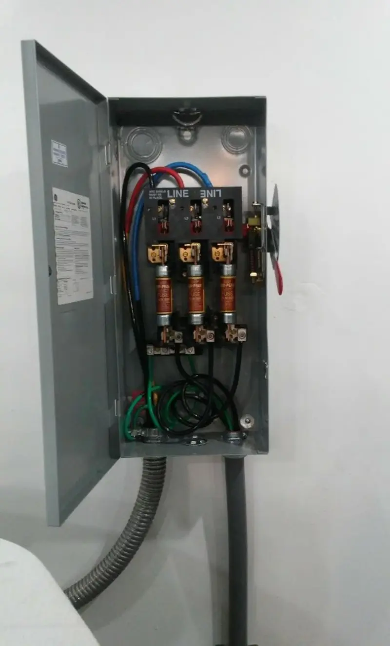Three-phase disconnect switch installed for Smoke Detector Installation in Millville